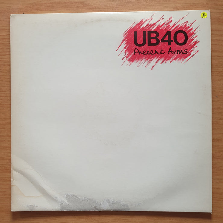 UB40 – Present Arms - (includes additional 45 RPM record) - Vinyl LP Record - Very-Good+ Quality (VG+)
