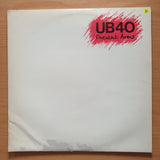 UB40 – Present Arms - (includes additional 45 RPM record) - Vinyl LP Record - Very-Good+ Quality (VG+)