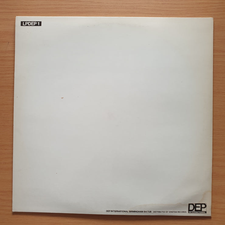 UB40 – Present Arms - (includes additional 45 RPM record) - Vinyl LP Record - Very-Good+ Quality (VG+)