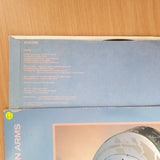 Dire Straits - Brothers In Arms (with original Lyrics) – Vinyl LP Record - Very-Good+ Quality (VG+) (verygoodplus)