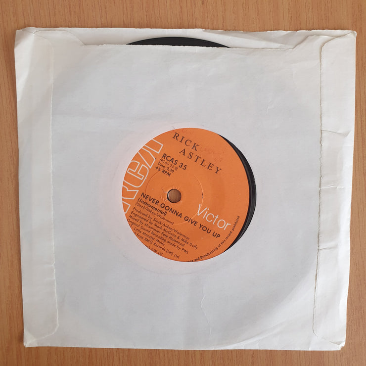 Rick Astley – Never Gonna Give You Up - 7" Vinyl Record  (VG+) (DLB)