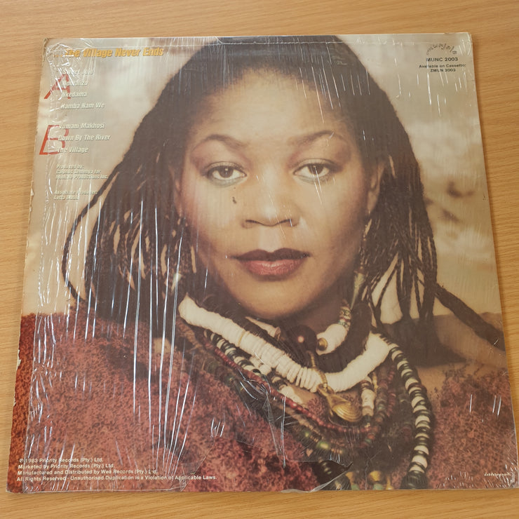 Letta Mbulu – In The Music......The Village Never Ends - Vinyl LP Record (VG)