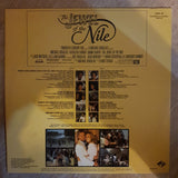 The Jewel Of The Nile: Music From The Motion Picture Soundtrack - Vinyl LP Record - Opened  - Very-Good- Quality (VG-) - C-Plan Audio