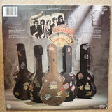 Traveling Wilburys ( Bob Dylan, George Harrison, Jeff Lynne, Roy Orbison, and Tom Petty) - Vol 1   ‎– Vinyl LP Record - Opened  - Good+ Quality (G+) - C-Plan Audio