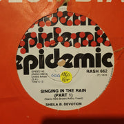 Sheila B. Devotion ‎– Singin' In The Rain  - Vinyl 7" Record - Very-Good+ Quality (VG+) - C-Plan Audio