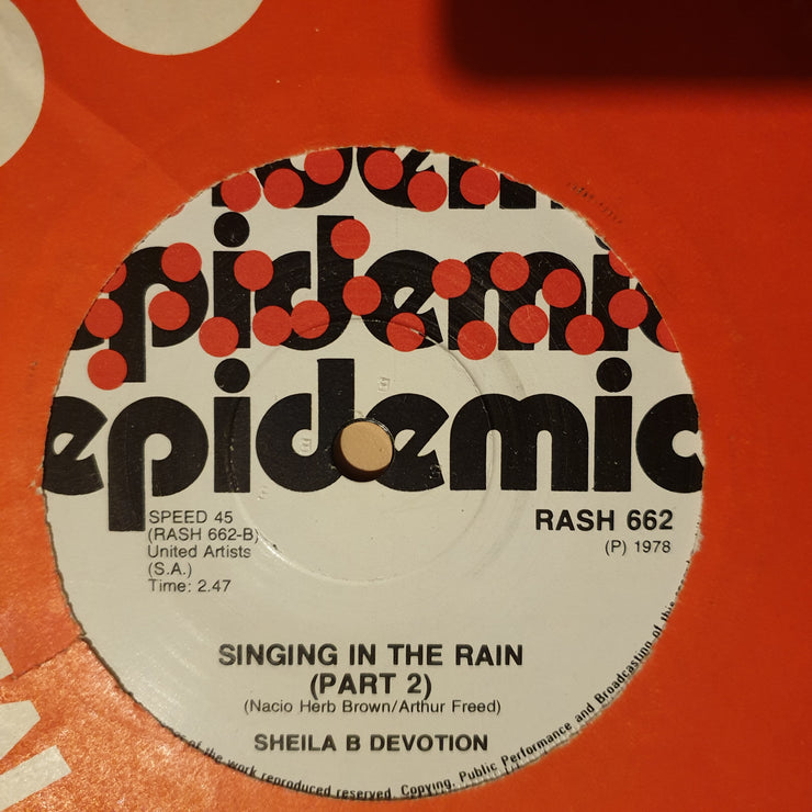 Sheila B. Devotion ‎– Singin' In The Rain  - Vinyl 7" Record - Very-Good+ Quality (VG+) - C-Plan Audio