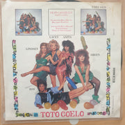 Toto Coelo ‎– I Eat Cannibals - Vinyl 7" Record - Very-Good+ Quality (VG+) - C-Plan Audio
