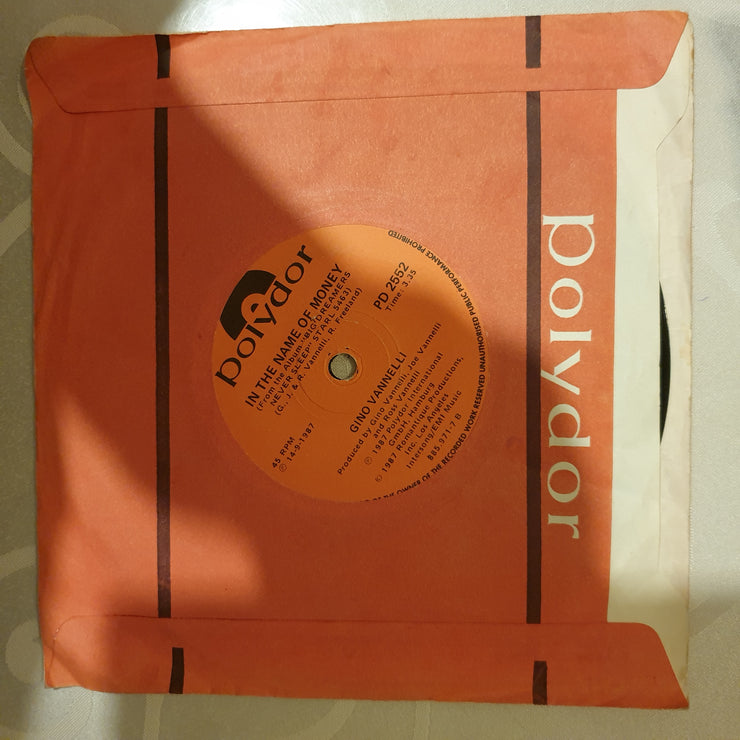 Gino Vannelli ‎– Persona Non Grata / In The Name Of Money - Vinyl 7" Record - Very-Good+ Quality (VG+) - C-Plan Audio