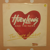 Huey Lewis & The News ‎– The Power Of Love / Bad Is Bad - Vinyl 7" Record - Very-Good+ Quality (VG+) - C-Plan Audio