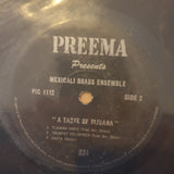 Sam Sklair, Mexicali Brass Ensemble ‎– A Taste Of Tijuana - Vinyl 7" Record - Very-Good Quality (VG)