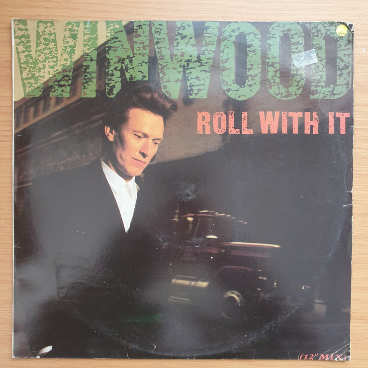 Steve Winwood – Roll With It -  Vinyl LP Record - Very-Good+ Quality (VG+)