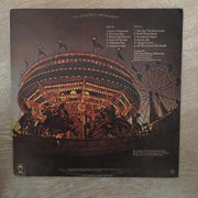 Tammy Jones ‎– Love's A Carousel - Vinyl LP Record - Opened  - Very-Good Quality (VG) - C-Plan Audio