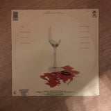 Dan Fogelberg - Exiles - Vinyl LP Record - Opened  - Very-Good+ Quality (VG+) - C-Plan Audio