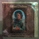 Gilbert O'Sullivan ‎– A Stranger In My Own Back Yard - Vinyl LP Record - Opened  - Very-Good Quality (VG) - C-Plan Audio