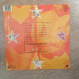 Dan Reed Network - The Heat ‎– Vinyl LP - Opened  - Very-Good+ Quality (VG+) - C-Plan Audio