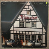 Triumvirat ‎– À La Carte - Vinyl LP Record - Opened  - Very-Good- Quality (VG-) - C-Plan Audio