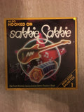 Also Hooked on Sakkie Sakkie - Vinyl LP Record - Opened  - Very-Good+ Quality (VG+) - C-Plan Audio