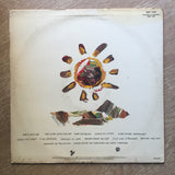 Eric Clapton ‎– Behind The Sun - Vinyl LP Record - Opened  - Very-Good Quality (VG) - C-Plan Audio